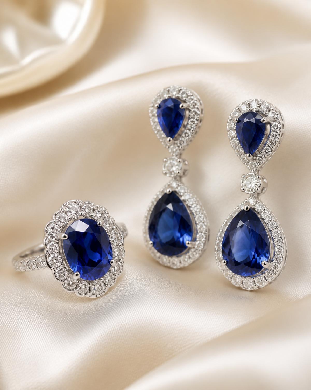 Sapphire halo suite — ring and drop earrings in platinum